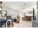 Bright living room with comfortable seating, stylish decor, and lots of natural light at 9645 Se 173Rd Pl, Summerfield, FL 34491