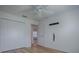 Empty bedroom with closet and view to the neighboring bedroom at 1346 Kilgore Way, The Villages, FL 32163