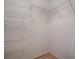 Walk-in closet with metal shelving for maximum storage and organization at 1346 Kilgore Way, The Villages, FL 32163