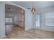 Open concept floor plan with dining room and view to other parts of the house at 1346 Kilgore Way, The Villages, FL 32163