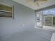 Enclosed lanai with ceiling fan at 1346 Kilgore Way, The Villages, FL 32163