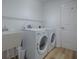 Laundry room featuring modern appliances at 1346 Kilgore Way, The Villages, FL 32163