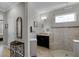 Bathroom featuring a glass-enclosed shower, vanity, and elegant fixtures, creating a spa-like experience at 1047 Timbervale Trl, Clermont, FL 34715