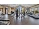 Modern exercise equipment and floor to ceiling windows in a fitness center at 1047 Timbervale Trl, Clermont, FL 34715