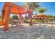 Relaxing poolside cabanas providing shaded seating areas near the community pool at 1047 Timbervale Trl, Clermont, FL 34715