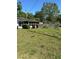 Home exterior featuring a small porch at 10517 52Nd Ct, Belleview, FL 34420