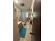 Bathroom featuring a tub and shower, plus wood-trimmed vanity at 10517 52Nd Ct, Belleview, FL 34420