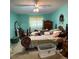 Spacious bedroom featuring light blue paint and carpeted floors at 10517 52Nd Ct, Belleview, FL 34420