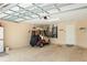 Clean garage with a golf cart parked inside at 1222 Camero Dr, The Villages, FL 32159