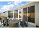 Outdoor patio features a fire pit and plenty of seating for entertaining guests at 1251 Saranac Pl, The Villages, FL 32163