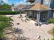 Aerial view of the home showcasing an expansive brick patio and beautifully landscaped backyard at 13519 Bristlecone Cir, Orlando, FL 32828