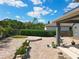 Secluded backyard featuring a brick patio, lush greenery and ample space for outdoor activities at 13519 Bristlecone Cir, Orlando, FL 32828