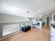 Versatile loft space with hardwood flooring, decorative furnishings and ample room for Gathering enjoyment at 13519 Bristlecone Cir, Orlando, FL 32828