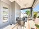 Charming patio area with comfortable seating and well-manicured landscaping at 13519 Bristlecone Cir, Orlando, FL 32828
