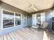 Inviting covered patio with ceiling fan, perfect for outdoor dining at 13519 Bristlecone Cir, Orlando, FL 32828