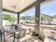 Relaxing patio space with views of the landscaped backyard at 13519 Bristlecone Cir, Orlando, FL 32828