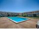 Inviting community pool is surrounded by well-maintained grounds, perfect for relaxation and recreation at 1400 Eudora Rd # A08, Mount Dora, FL 32757