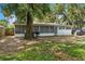 View of the house and the backyard at 1406 Spartan Ave, Leesburg, FL 34748