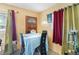 Cozy dining room with table and four chairs at 1406 Spartan Ave, Leesburg, FL 34748