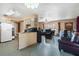 Open concept featuring the kitchen flowing into the living room at 1406 Spartan Ave, Leesburg, FL 34748