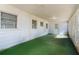 Enclosed patio with windows and outdoor access at 1406 Spartan Ave, Leesburg, FL 34748