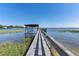 Enjoy the waterfront lifestyle with this private dock, perfect for boating and fishing on the lake at 16047 E Shirley Shores Rd, Tavares, FL 32778