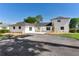 Newly renovated home with a new roof, updated landscaping, and a welcoming driveway at 16047 E Shirley Shores Rd, Tavares, FL 32778