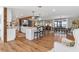 Open-concept living and dining areas with views of the lake, perfect for entertaining and Gathering gatherings at 16047 E Shirley Shores Rd, Tavares, FL 32778