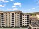 Exterior of an apartment building on a sunny day at 16300 County Road 455 # 511, Montverde, FL 34756
