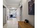 Bright hallway with tile floors and access to living areas at 16300 County Road 455 # 511, Montverde, FL 34756