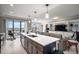 Spacious island kitchen with stainless appliances and a lake view at 16300 County Road 455 # 511, Montverde, FL 34756