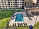 Aerial view of pool with many lounge chairs around it at 16300 County Road 455 # 511, Montverde, FL 34756