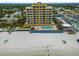 An inviting beach-front condo building with a pool and deck area at 1705 S Atlantic Ave # 502, New Smyrna Beach, FL 32169