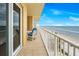 Relaxing condo balcony featuring ocean views with plenty of room for outdoor seating at 1705 S Atlantic Ave # 502, New Smyrna Beach, FL 32169