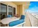 Spacious balcony with seating area, perfect for enjoying ocean views at 1705 S Atlantic Ave # 502, New Smyrna Beach, FL 32169