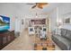 Open concept living area leading to a modern kitchen and dining area at 1705 S Atlantic Ave # 502, New Smyrna Beach, FL 32169