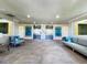 Welcoming lobby with elevator access, comfortable seating, and stylish decor for residents and guests at 1705 S Atlantic Ave # 502, New Smyrna Beach, FL 32169
