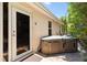 Backyard patio with outdoor hot tub and easy access from the house at 1716 Bugle Ter, The Villages, FL 32162