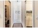 Hallway view of access to closet and bedroom at 1716 Bugle Ter, The Villages, FL 32162
