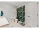 Bathroom featuring tile floors, light grey walls, and a shower with decorative shower curtain at 17806 Se 97Th Ct, Summerfield, FL 34491