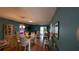 Dining room with a view into the living room at 17930 Se 83Rd Melody Ave, The Villages, FL 32162