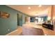 Open concept kitchen with countertop overlooking living area at 17930 Se 83Rd Melody Ave, The Villages, FL 32162