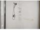 Shower stall featuring a showerhead, grab bar, and corner shelves for toiletries at 17985 Se 102Nd Ct, Summerfield, FL 34491