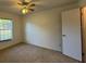 This bedroom features a window and adjacent closet at 1805 Ne 29Th Pl, Ocala, FL 34479