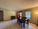 Inviting dining room with wood table, tile floors, and natural light at 1805 Ne 29Th Pl, Ocala, FL 34479