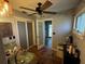 Bathroom featuring dual sinks, updated fixtures, and tile flooring with an open doorway at 18130 Keene Rd, Altoona, FL 32702