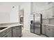 Kitchen includes stainless steel appliances, quartz countertops, and a stainless dishwasher at 1860 Park Forest Blvd, Mount Dora, FL 32757