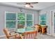 Inviting dining area with ample light, perfect for Gathering meals and entertaining guests at 1871 W Schwartz Blvd, Lady Lake, FL 32159