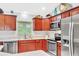 Well-appointed kitchen with stainless steel appliances, plenty of storage, and modern fixtures at 1871 W Schwartz Blvd, Lady Lake, FL 32159
