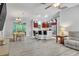 Open-concept living room with a view to the kitchen and dining area, offering ample seating space at 1871 W Schwartz Blvd, Lady Lake, FL 32159
